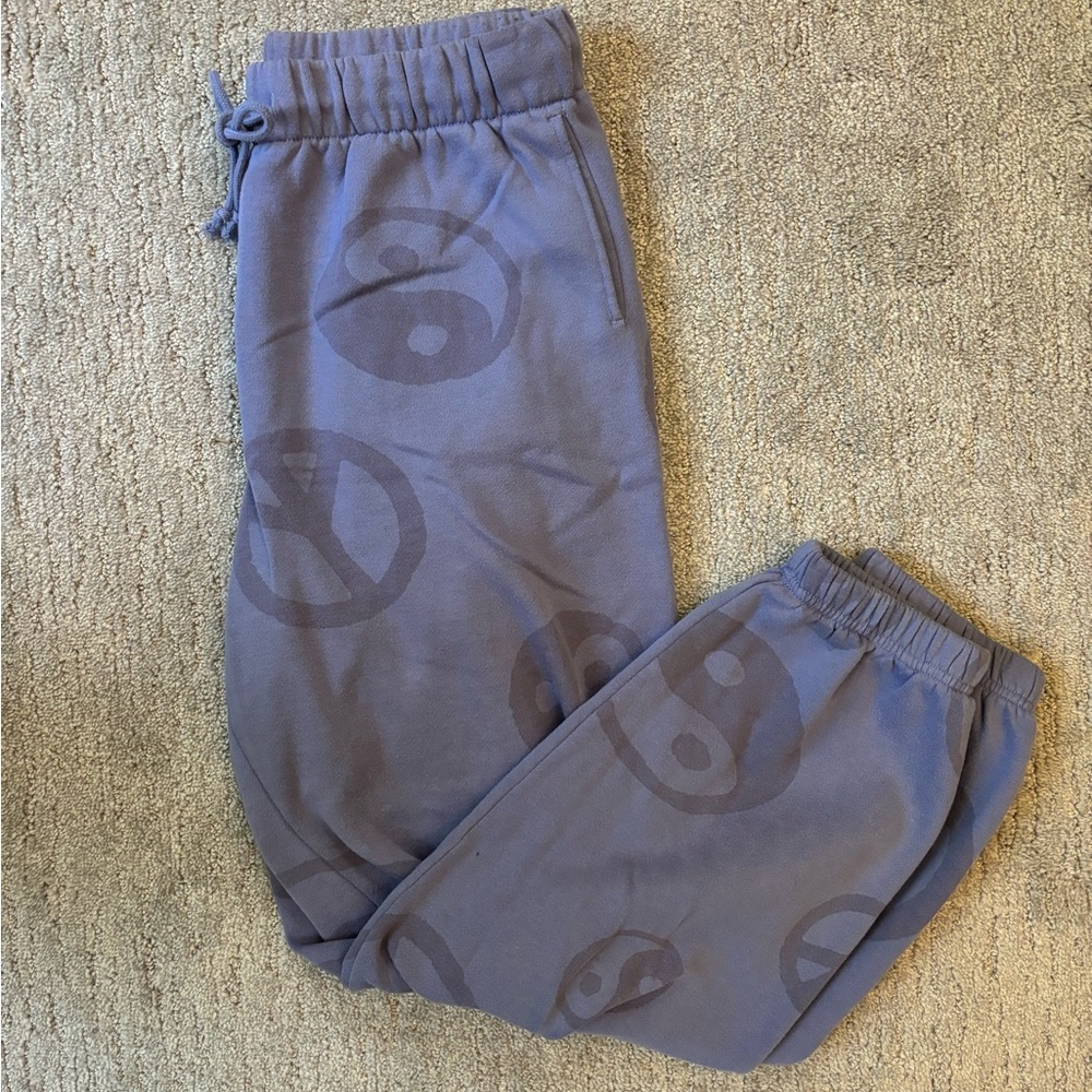 Pacsun purple drawstring sweatpant joggers with peace, sign, and yin yang design